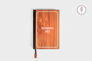 Wood grain hardcover journal with black spine and ribbon bookmark, featuring a customizable brandable area